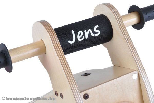 Optioneel: kinbeschermer met naam.