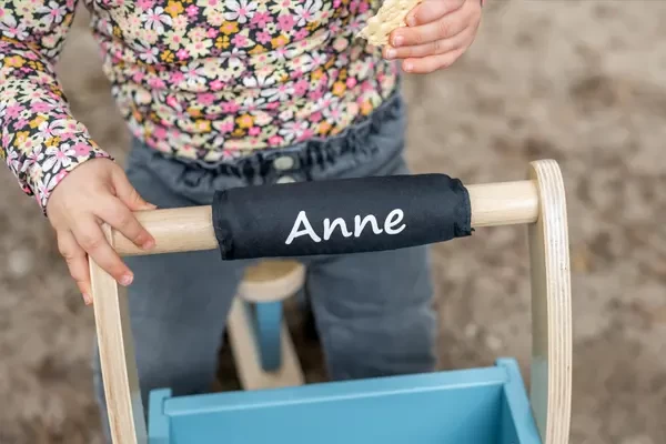 Optioneel: kinbeschermer met naam