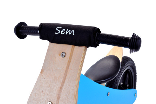 Optioneel: kinbeschermer met eigen naam.